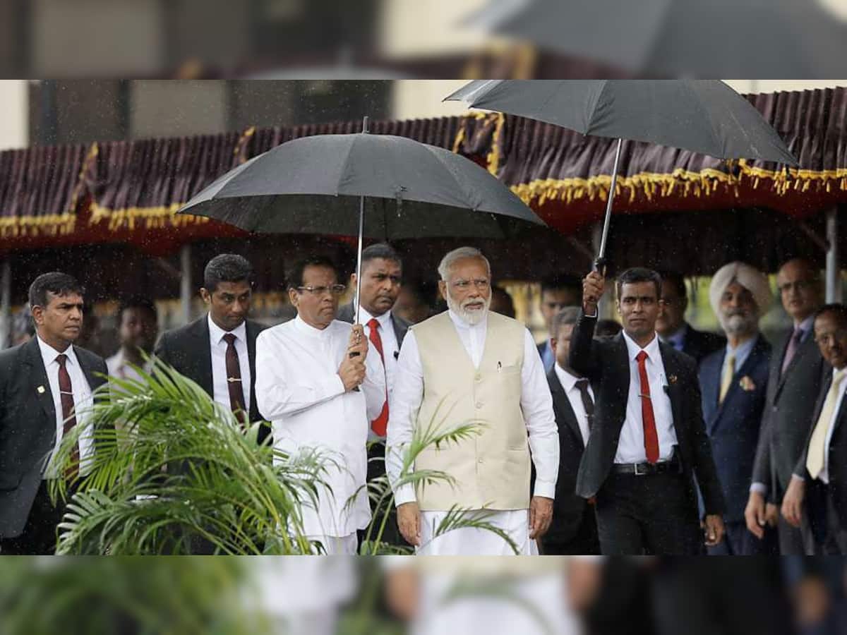 PM મોદીની જોવા મળી પ્રતિષ્ઠા, શ્રીલંકાના રાષ્ટ્રપતિએ વરસાદ દરમિયાન પકડી છત્રી