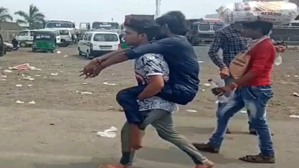 અમદાવાદ: લોકડાઉન છતા પણ UP, MP અને રાજસ્થાની શ્રમજીવીઓની હિજરત યથાવત્ત અમદાવાદ: લોકડાઉન છતા પણ UP, MP અને રાજસ્થાની શ્રમજીવીઓની હિજરત યથાવત્ત