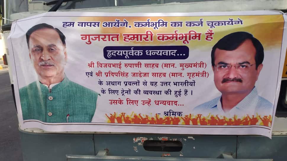 અમદાવાદ: શ્રમિકોને લઇ જતી એસટી બસ પર 'હમ વાપસ આએગે'ના સૂત્ર સાથે લાગ્યા પોસ્ટર અમદાવાદ: શ્રમિકોને લઇ જતી એસટી બસ પર 'હમ વાપસ આએગે'ના સૂત્ર સાથે લાગ્યા પોસ્ટર