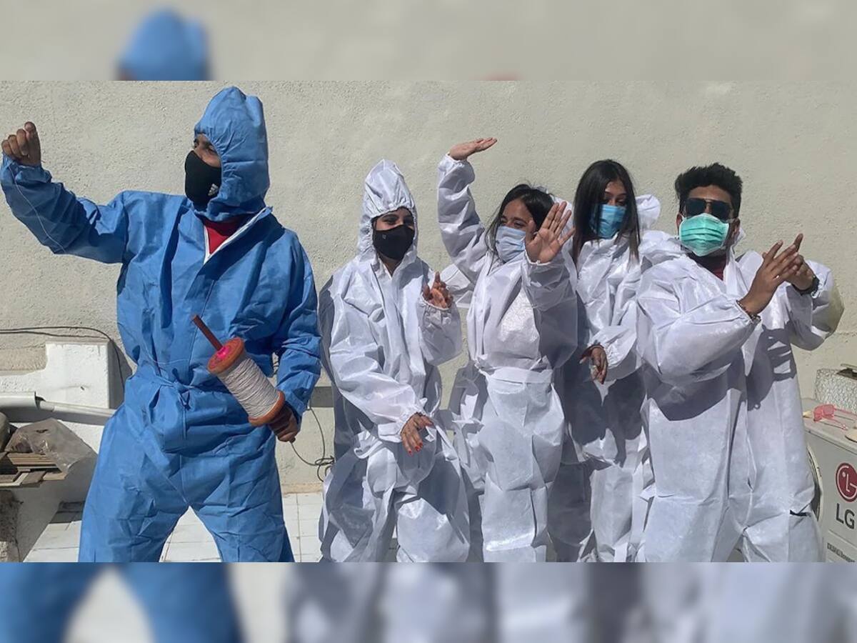 રંગીલા રાજકોટ વાસીઓએ PPE કીટ પહેરીને પતંગો ચગાવ્યા અને ધાબા પર ડાન્સ કર્યો