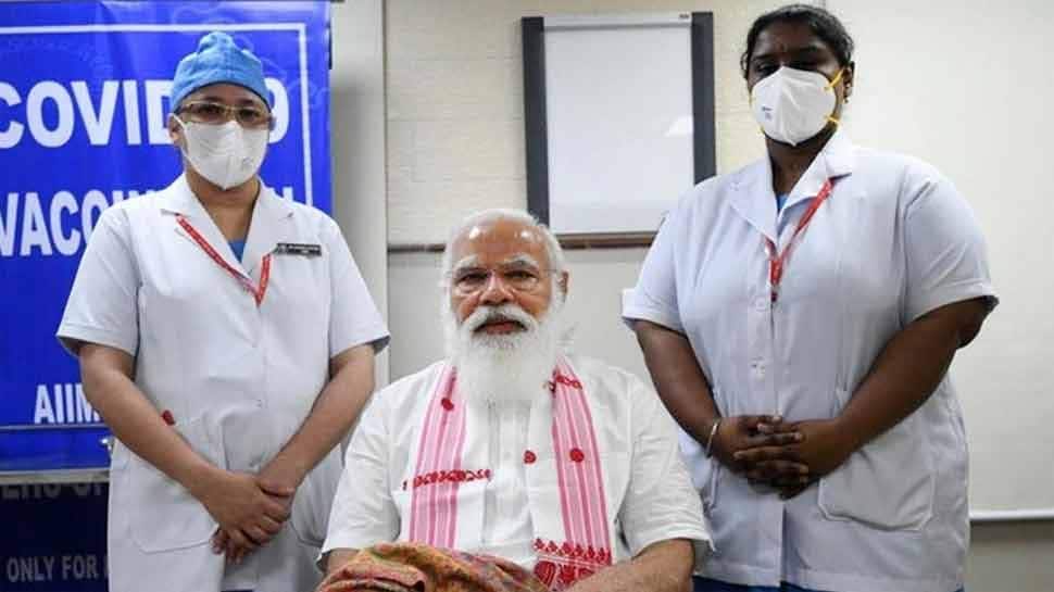 ... જ્યારે વેક્સિન લેવા દરમિયાન PM મોદીએ નર્સને કહ્યુ- નેતા જાડી ચામડીના હોય છે, મોટી સોય લગાવજો ... જ્યારે વેક્સિન લેવા દરમિયાન PM મોદીએ નર્સને કહ્યુ- નેતા જાડી ચામડીના હોય છે, મોટી સોય લગાવજો