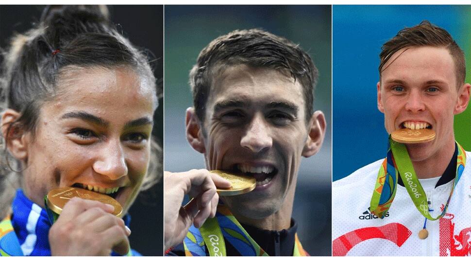 Tokyo Olympic : મેડલ જીત્યા પછી દાંત નીચે કેમ રાખે છે ખેલાડી? કારણ જાણી માથું ખંજવાળશો Tokyo Olympic : મેડલ જીત્યા પછી દાંત નીચે કેમ રાખે છે ખેલાડી? કારણ જાણી માથું ખંજવાળશો