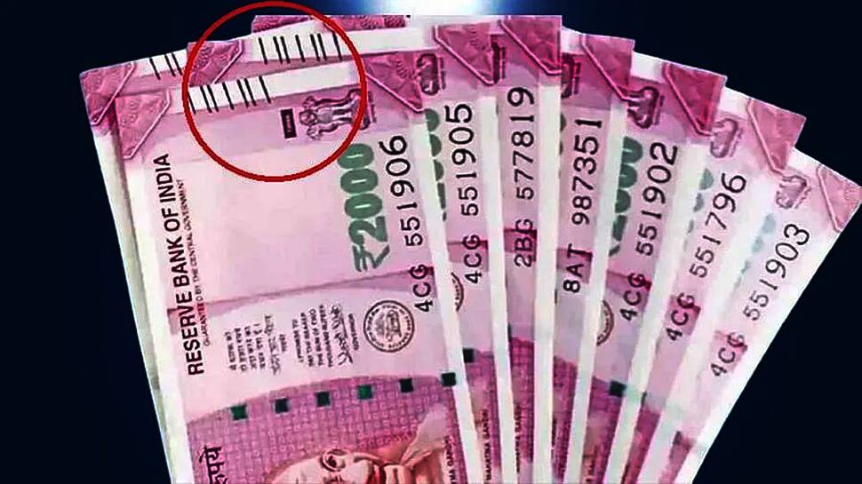 2000 રૂપિયાની નોટ પર ખૂણામાં કાળી લાઈન કેમ હોય છે? જાણો ભારતીય ચલણી નોટ સાથે જોડાયેલી રોચક વાતો 2000 રૂપિયાની નોટ પર ખૂણામાં કાળી લાઈન કેમ હોય છે? જાણો ભારતીય ચલણી નોટ સાથે જોડાયેલી રોચક વાતો