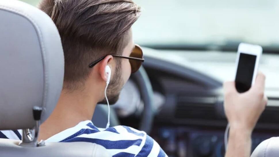 Traffic challan rules enalty for using Bluetooth earphones while Driving