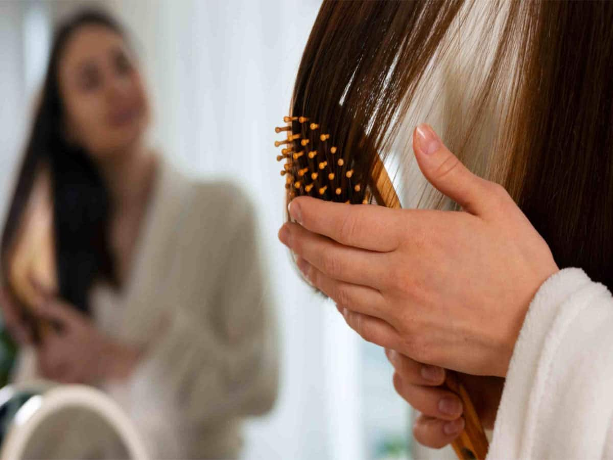 Hair Fall: નાળિયેર તેલમાં આ વસ્તુ મિક્સ કરી વાળમાં લગાડો, કાંસકામાં નહીં દેખાય એક પણ વાળ