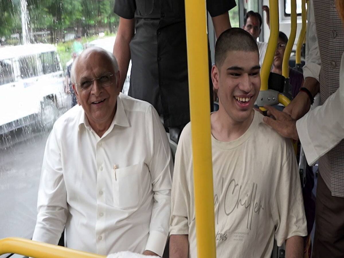 Gujarat CM Bhupendra Patel with divyang kid in e bus