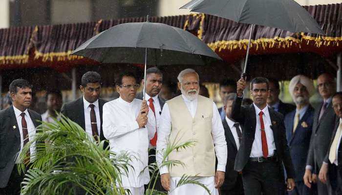 PM મોદીની જોવા મળી પ્રતિષ્ઠા, શ્રીલંકાના રાષ્ટ્રપતિએ વરસાદ સમયે પકડી છત્રી