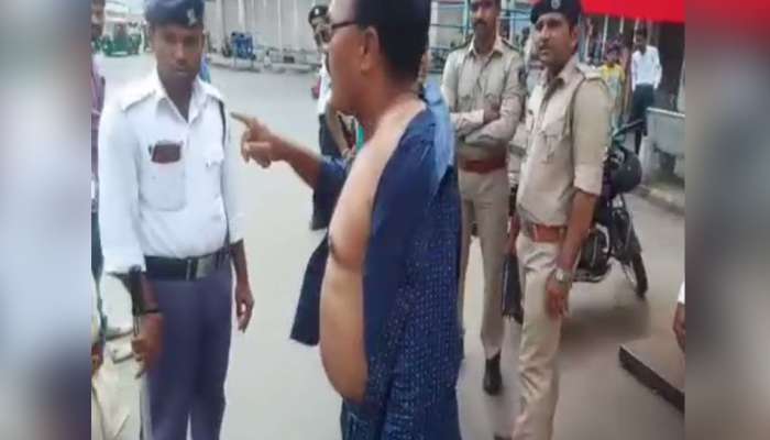 અમદાવાદ: ટ્રાફિક નિયમોનું પાલન કરાવતા પોલીસ સામે વાહન ચાલકે કપડા કાઢ્યા