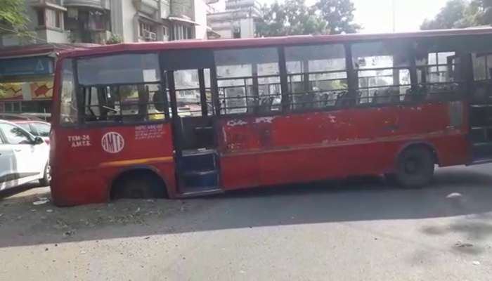Ahmedabad : મોટા ખાડામાં ફસાઈ AMTS બસ, આગળ-પાછળ ખસી પણ ન શકી....!!!