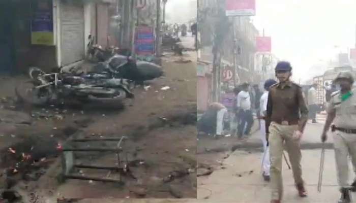 West Bengal: BJP-TMC કાર્યકર્તાઓ વચ્ચે ઝપાઝપી, ધ્વજને લઇને વિવાદ West Bengal: BJP-TMC કાર્યકર્તાઓ વચ્ચે ઝપાઝપી, ધ્વજને લઇને વિવાદ
