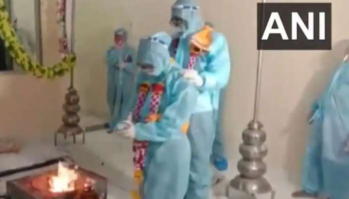 Viral video: વરરાજા થયો કોરોના પોઝિટિવ, દુલ્હા-દુલ્હને PPE કીટ પહેરીને લીધા સાત ફેરા