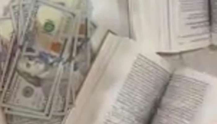 મુંબઈ એરપોર્ટ કસ્ટમ્સે વિદેશીઓની કરી ધરપકડ!  પુસ્તકમાંથી મળી આવ્યા અધધધ...90,000 અમેરિકન ડોલર  
