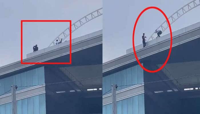 Surat : હાઈરાઈઝ ઈમારતની છત પર રીલ્સ બનાવતા બે યુવકોની અટકાયત, પોલીસે માફી મંગાવી 