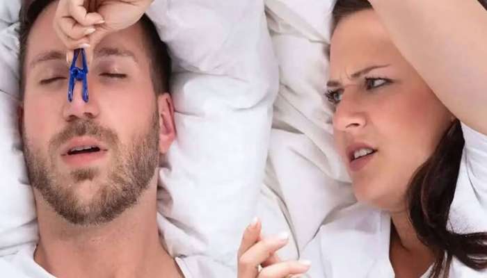Snoring: શું તમારા પાર્ટનર સુતી વખતે ભારે નસકોરા બોલાવે છે? આ રીતે દૂર કરો સમસ્યા