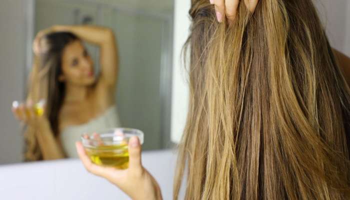 Oil For Long Hair: કમર સુધી લાંબા વાળ ઝડપથી થશે, વાળમાં નિયમિત લગાવો આ 6 માંથી કોઈ 1 તેલ