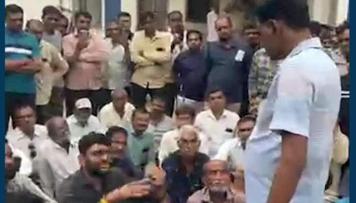 mla gopal italia in visavadar police station watch video