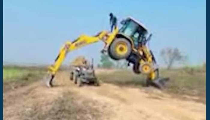 જીવના જોખમે JCB પર સ્ટંટબાજી કરતો યુવક, વીડિયો થયો વાયરલ 
