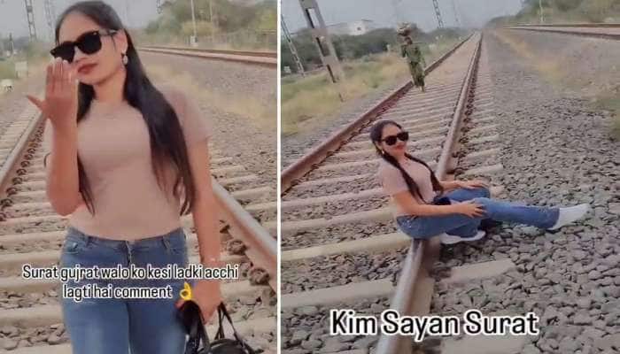 ગુજરાતના યુવાઓમાં પોપ્યુલર થવાનો નવો ક્રેઝ! રેલવે ટ્રેક પર બેસીને યુવતીએ બનાવી Reel 